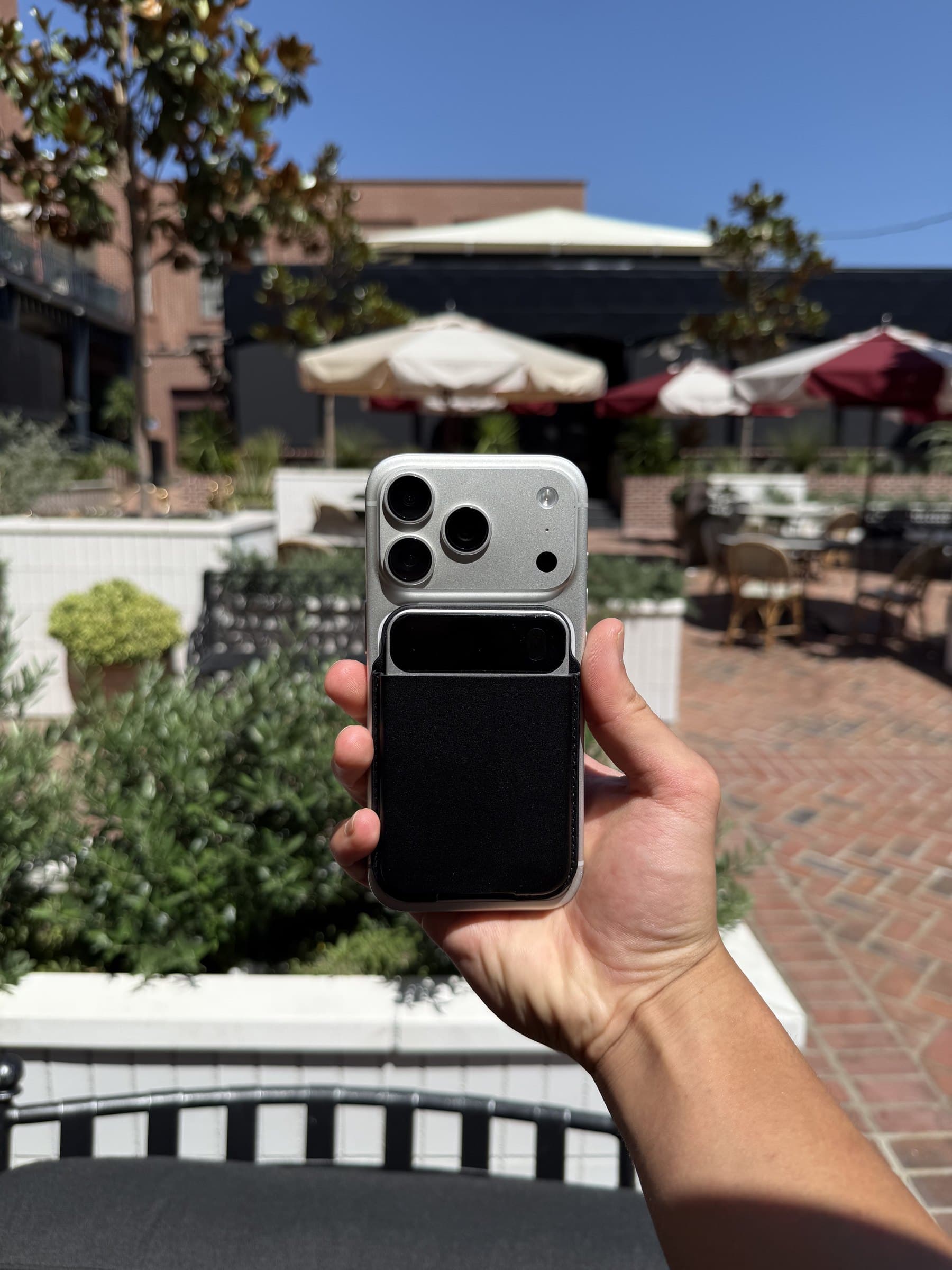Moment Pro on the back of a silver iPhone 17 Pro
