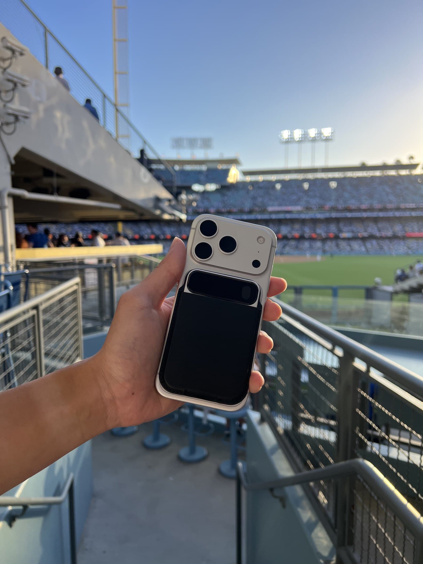 Moment Pro on an iPhone at a ballpark during the day
